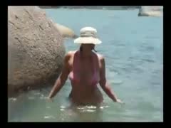 Busty and curvaceous milf sexy horny white wife on the beach